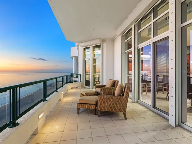 a large en suite bathroom with a large tub and shower