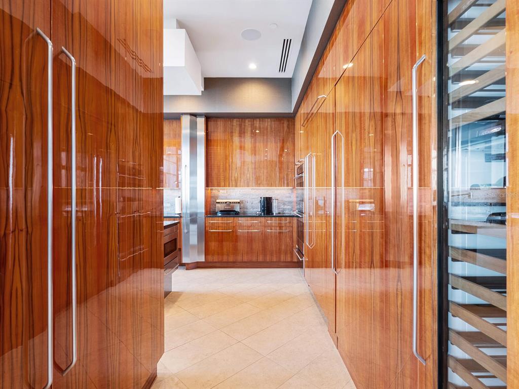 655 Longboat Club Road, Unit 1PH Longboat Key, FL 34228 - Photo 22 of 53 a large en suite bathroom with a large tub and shower