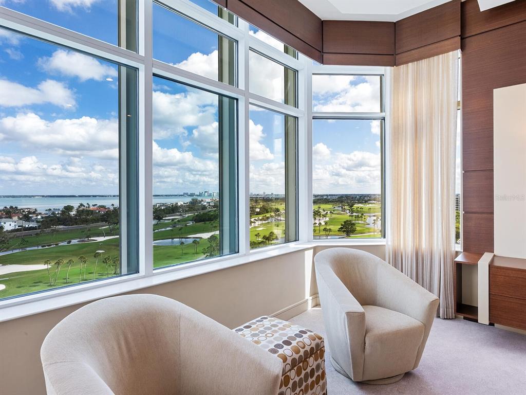 655 Longboat Club Road, Unit 1PH Longboat Key, FL 34228 - Photo 33 of 53 a living room with couch and a floor to ceiling window