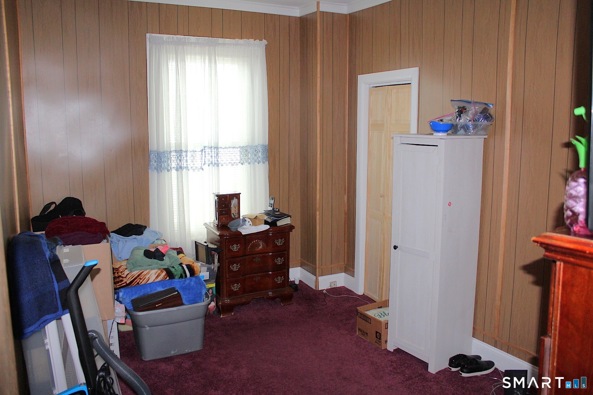 90 Franklin Street Meriden, CT 06450 - Photo 8 of 40 a living room with furniture and a window