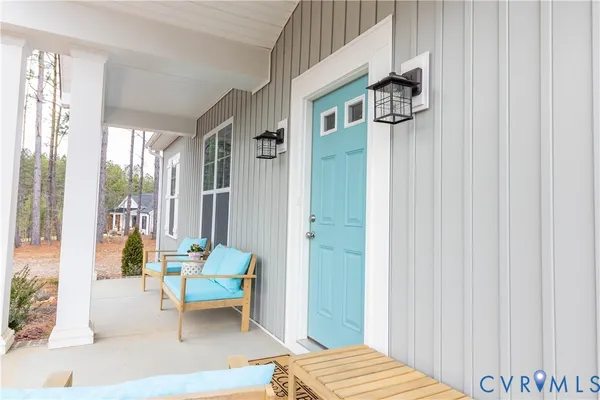 a living room with furniture and a table