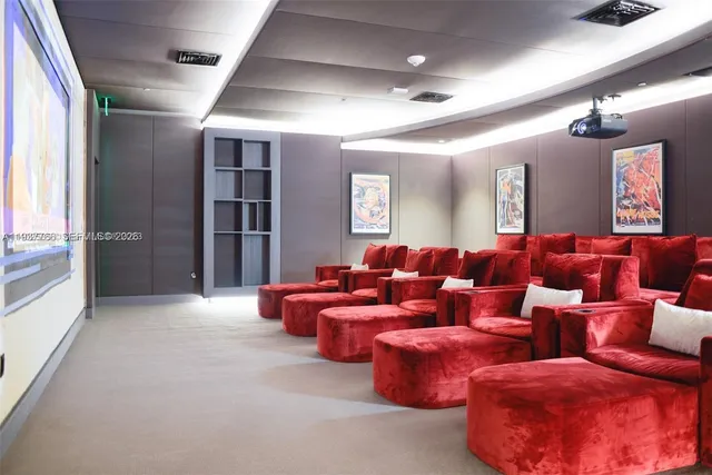 a room with a table and chairs