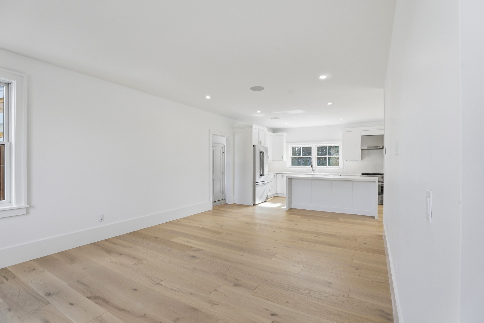 10 Rudder Lane Nantucket, MA 02554 - Photo 11 of 33 a view of an empty room with a kitchen