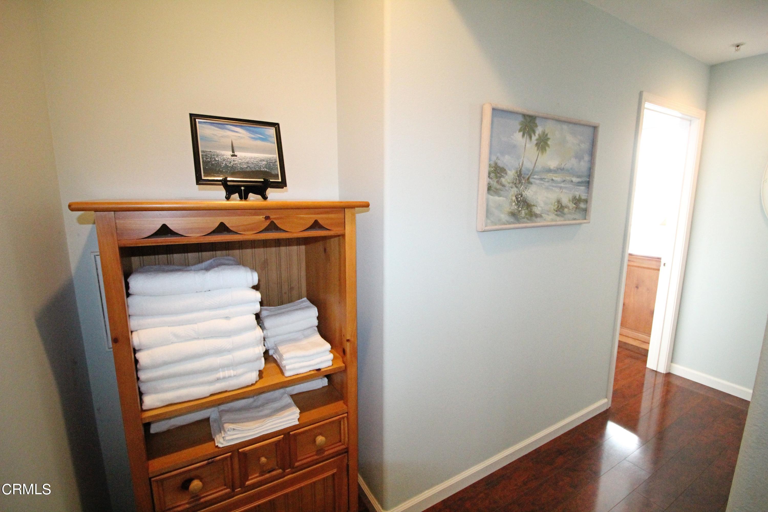 1428 Windshore Way Oxnard, CA 93035 - Photo 12 of 29 a view of hallway with wooden floor