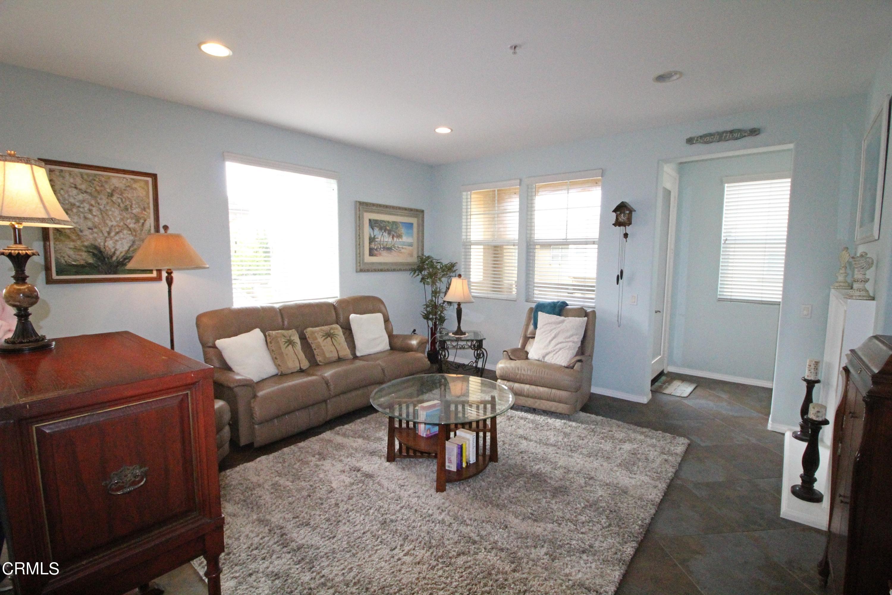 1428 Windshore Way Oxnard, CA 93035 - Photo 2 of 29 a living room with furniture and a window