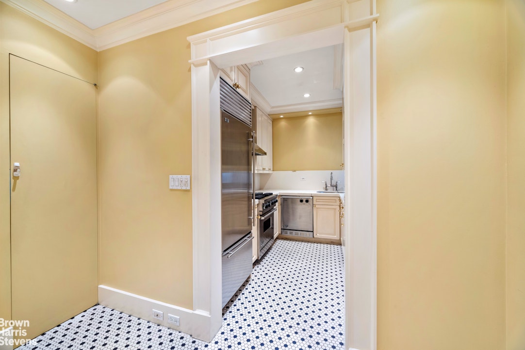 14 Sutton Place South, Unit 6F Manhattan, NY 10022 - Photo 10 of 14 a bathroom with a sink and a mirror