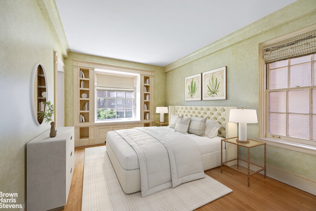 14 Sutton Place South, Unit 6F Manhattan, NY 10022 - Photo 3 of 14 a bedroom with a large bed and a window