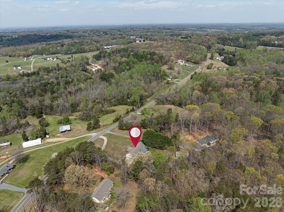 4624 South Olivers Cross Road Maiden, NC 28650 - Photo 48 of 48 an aerial view of a house with a yard