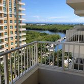a view of a balcony with city view