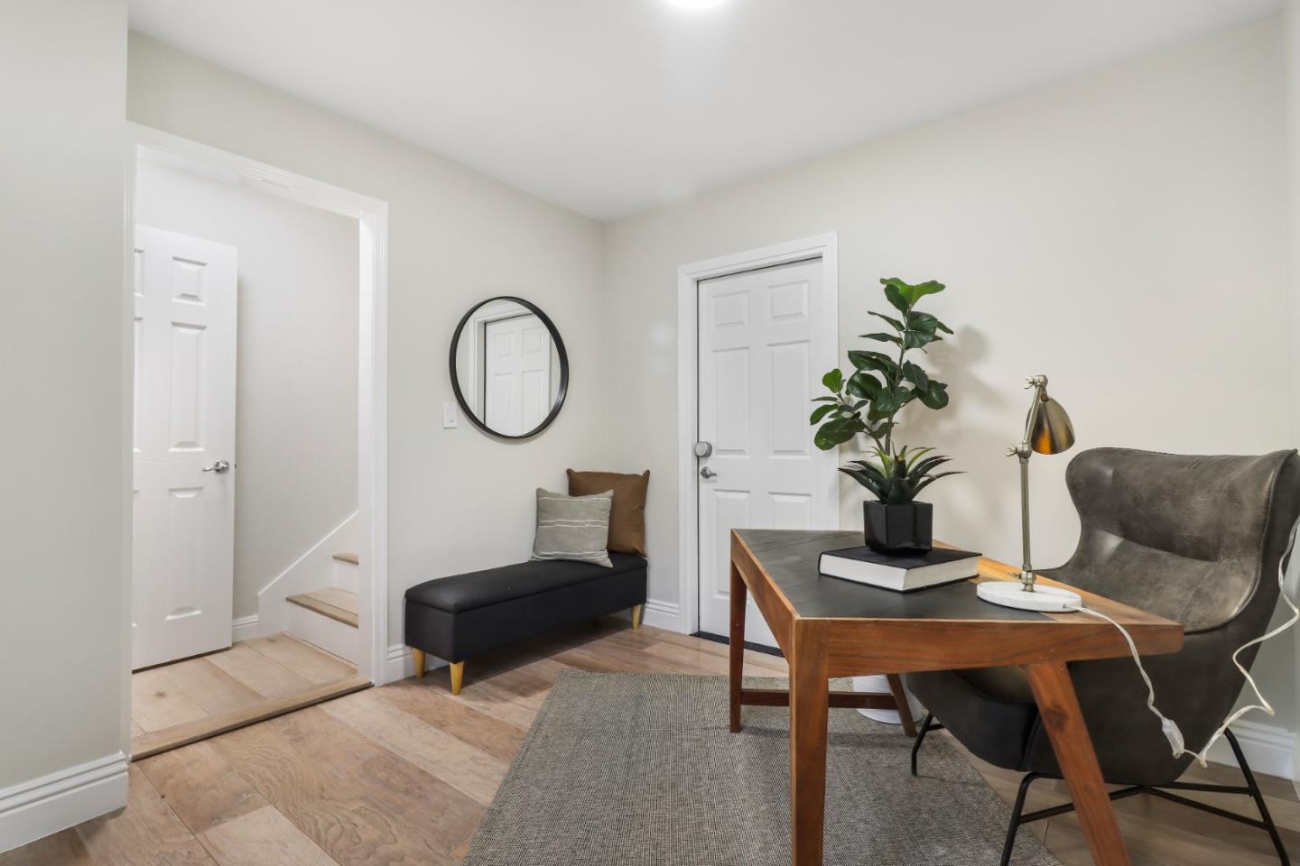 155 Pacchetti Way Mountain View, CA 94040 - Photo 15 of 35 a living room with furniture a rug and a potted plant
