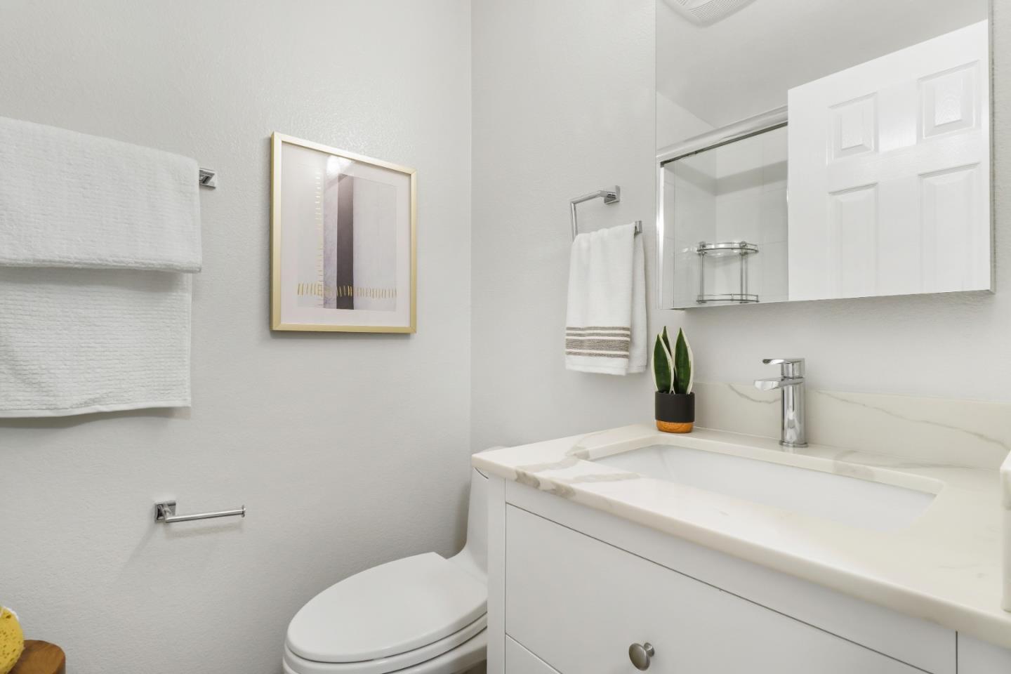 155 Pacchetti Way Mountain View, CA 94040 - Photo 16 of 35 a bathroom with a granite countertop toilet sink and mirror