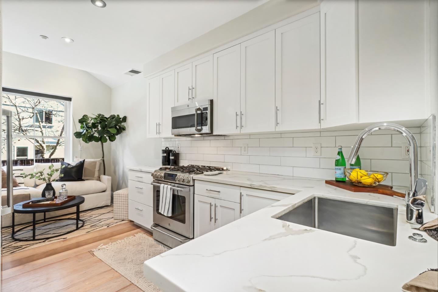 155 Pacchetti Way Mountain View, CA 94040 - Photo 8 of 35 a kitchen with stainless steel appliances a stove a sink a microwave a refrigerator and cabinets