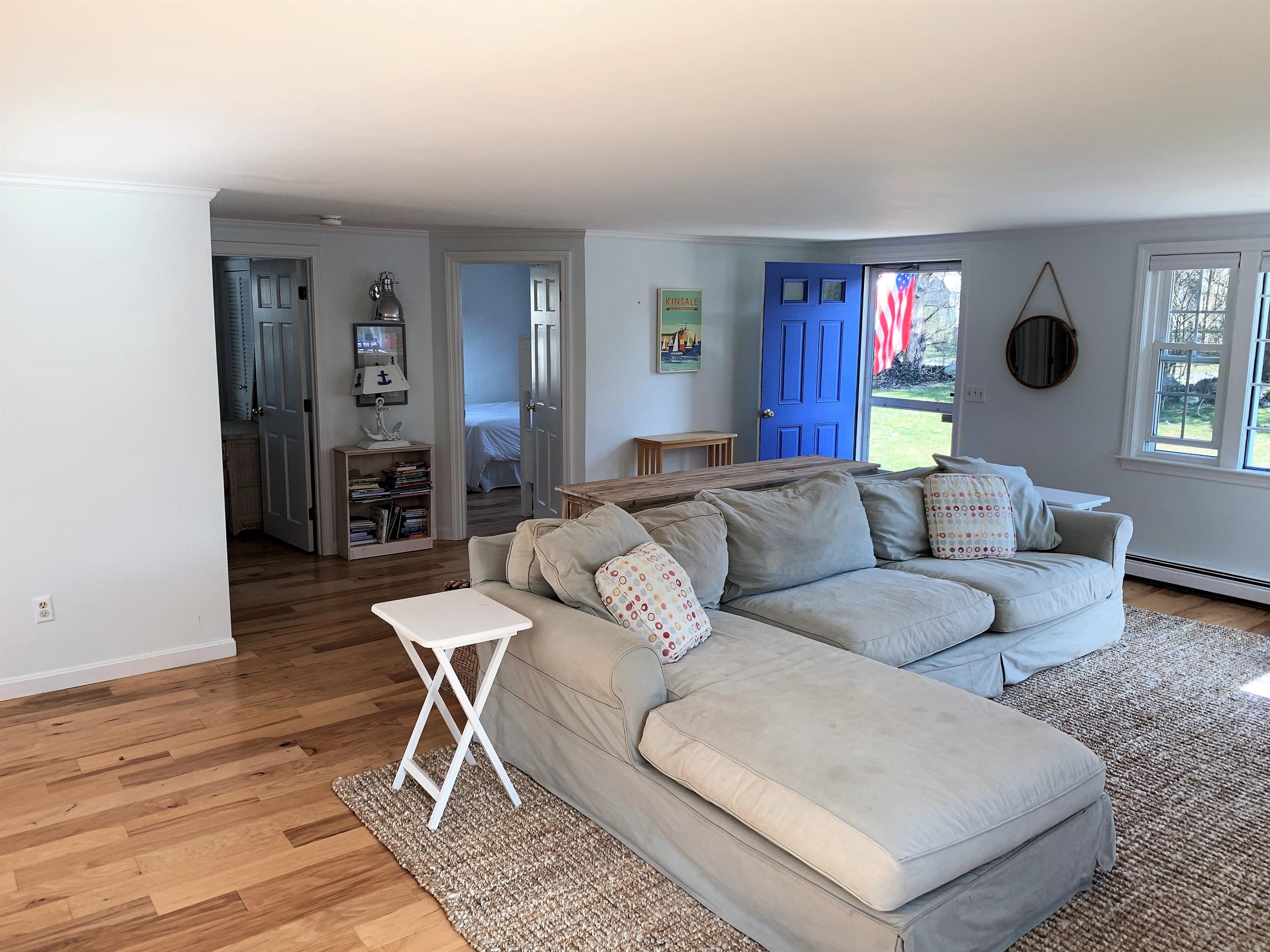84 Nauset Heights Road Orleans, MA 02653 - Photo 11 of 24 a living room with furniture and a window