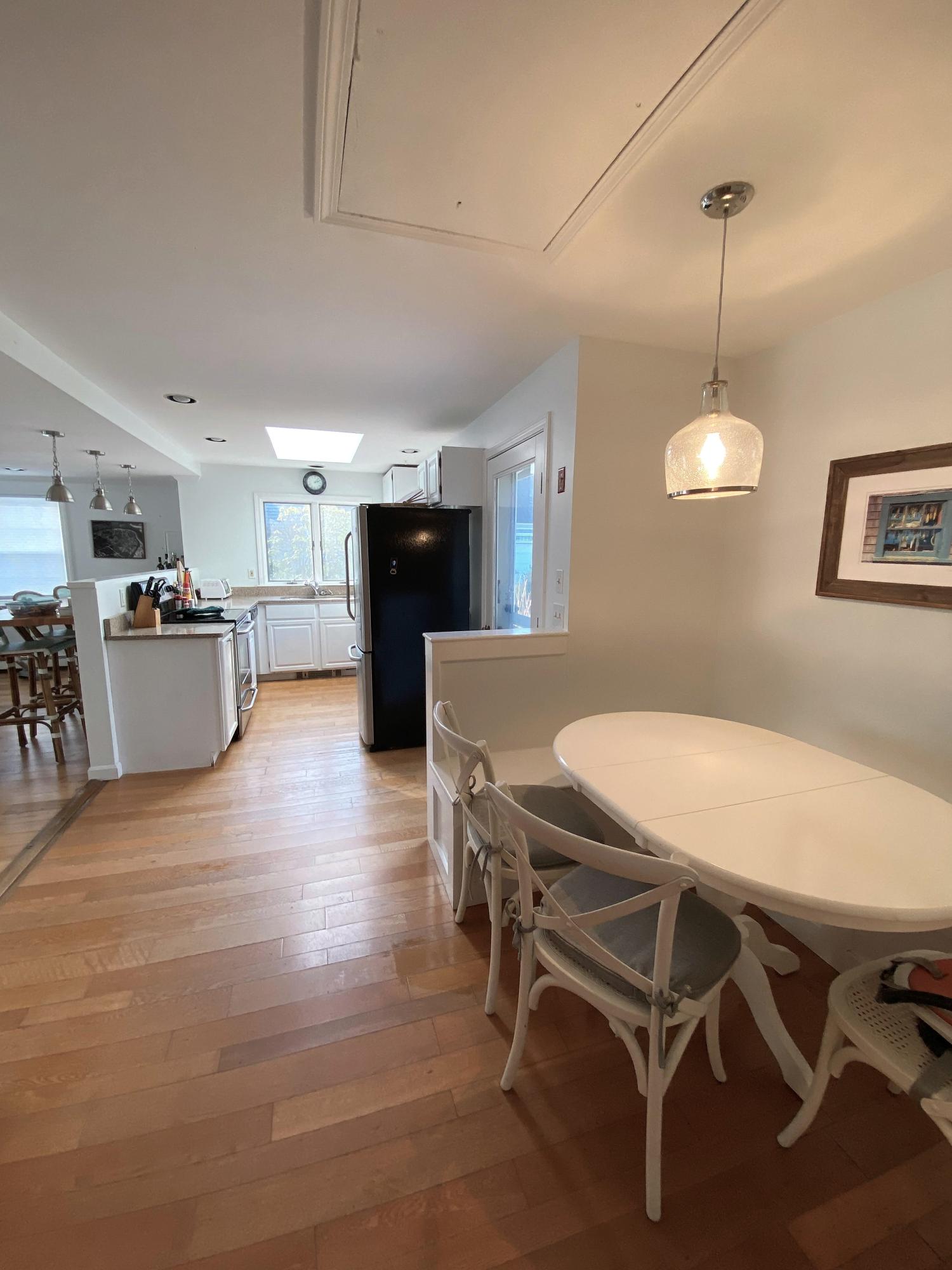 84 Nauset Heights Road Orleans, MA 02653 - Photo 14 of 24 a view of a dining room with furniture