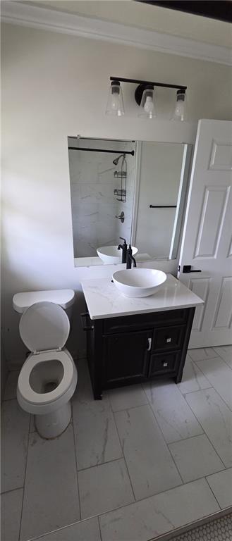 628 Farrar Court Avondale Estates, GA 30002 - Photo 11 of 17 a bathroom with a sink and a toilet