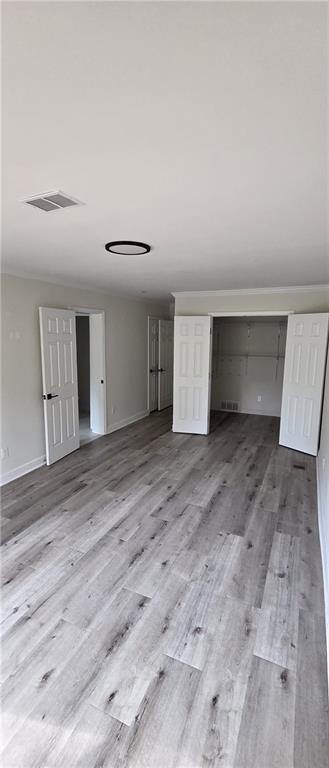 628 Farrar Court Avondale Estates, GA 30002 - Photo 17 of 17 a view of empty room with wooden floor