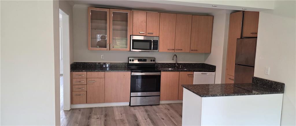 628 Farrar Court Avondale Estates, GA 30002 - Photo 2 of 17 a kitchen with a stove and a microwave