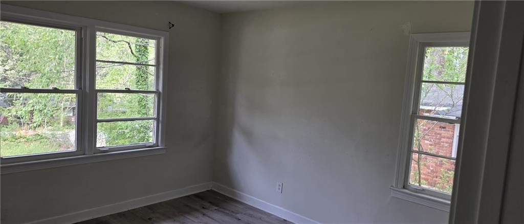 628 Farrar Court Avondale Estates, GA 30002 - Photo 4 of 17 a view of an empty room and window
