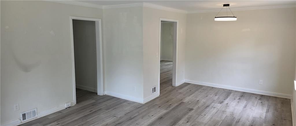 628 Farrar Court Avondale Estates, GA 30002 - Photo 5 of 17 a view of a hallway with wooden floor