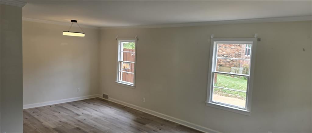 628 Farrar Court Avondale Estates, GA 30002 - Photo 6 of 17 a view of an empty room with a window