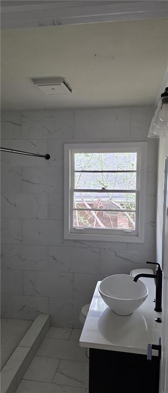 628 Farrar Court Avondale Estates, GA 30002 - Photo 9 of 17 a bathroom with a sink and a mirror