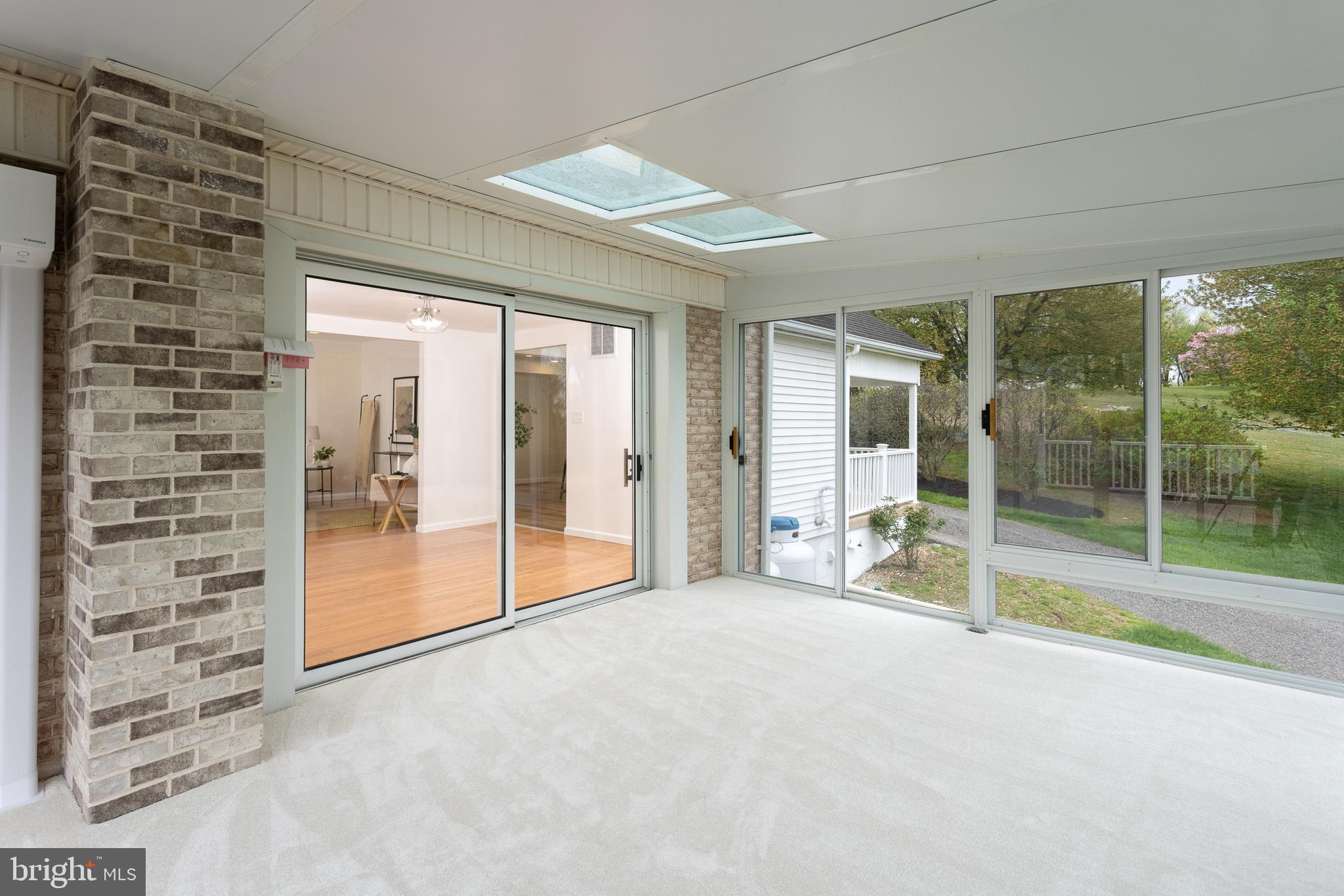 16742 Ridge Road Upperco, MD 21155 - Photo 14 of 38 a large room with a large window and pool table