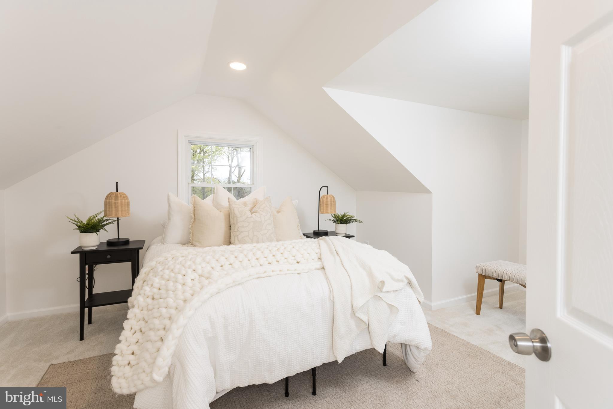 16742 Ridge Road Upperco, MD 21155 - Photo 22 of 38 a bed room with a bed and a lamp