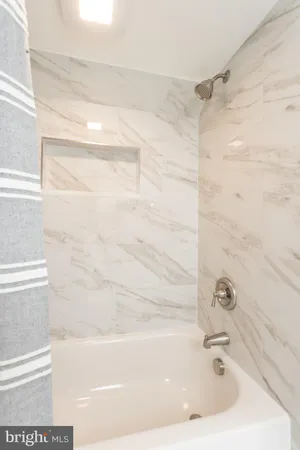 a bathroom with a bathtub