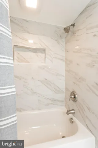 a bathroom with a bathtub