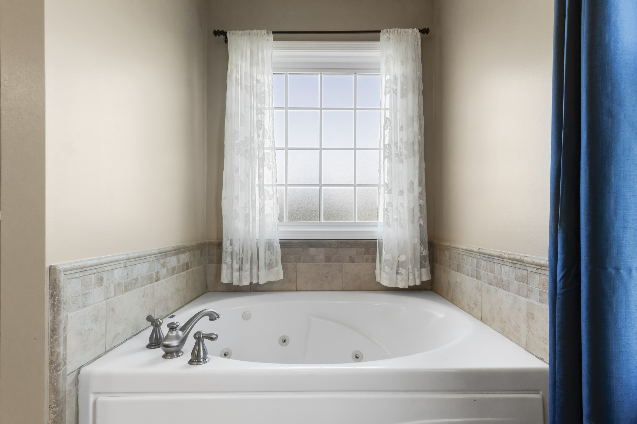 3382 Anderson Road Cedar Hill, TN 37032 - Photo 16 of 41 a bathroom with a bathtub