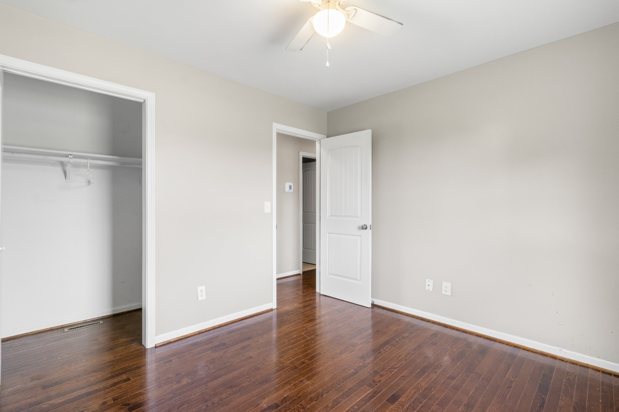 3382 Anderson Road Cedar Hill, TN 37032 - Photo 20 of 41 a view of an empty room with wooden floor