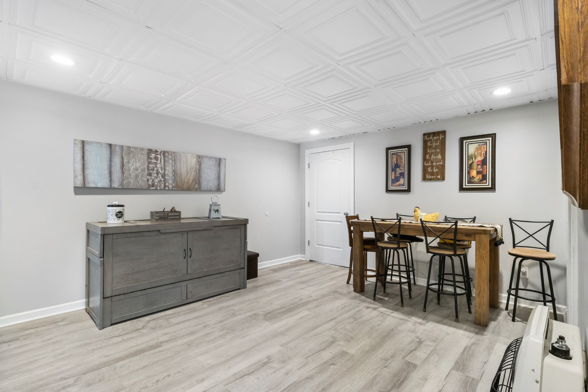3382 Anderson Road Cedar Hill, TN 37032 - Photo 23 of 41 a living room with furniture and a dining table with wooden floor