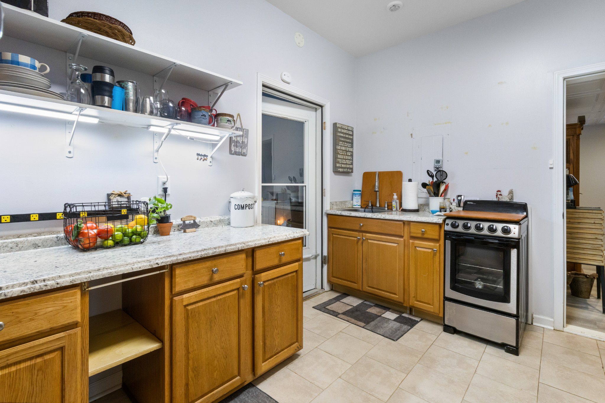 3382 Anderson Road Cedar Hill, TN 37032 - Photo 26 of 41 a kitchen with a sink and cabinets
