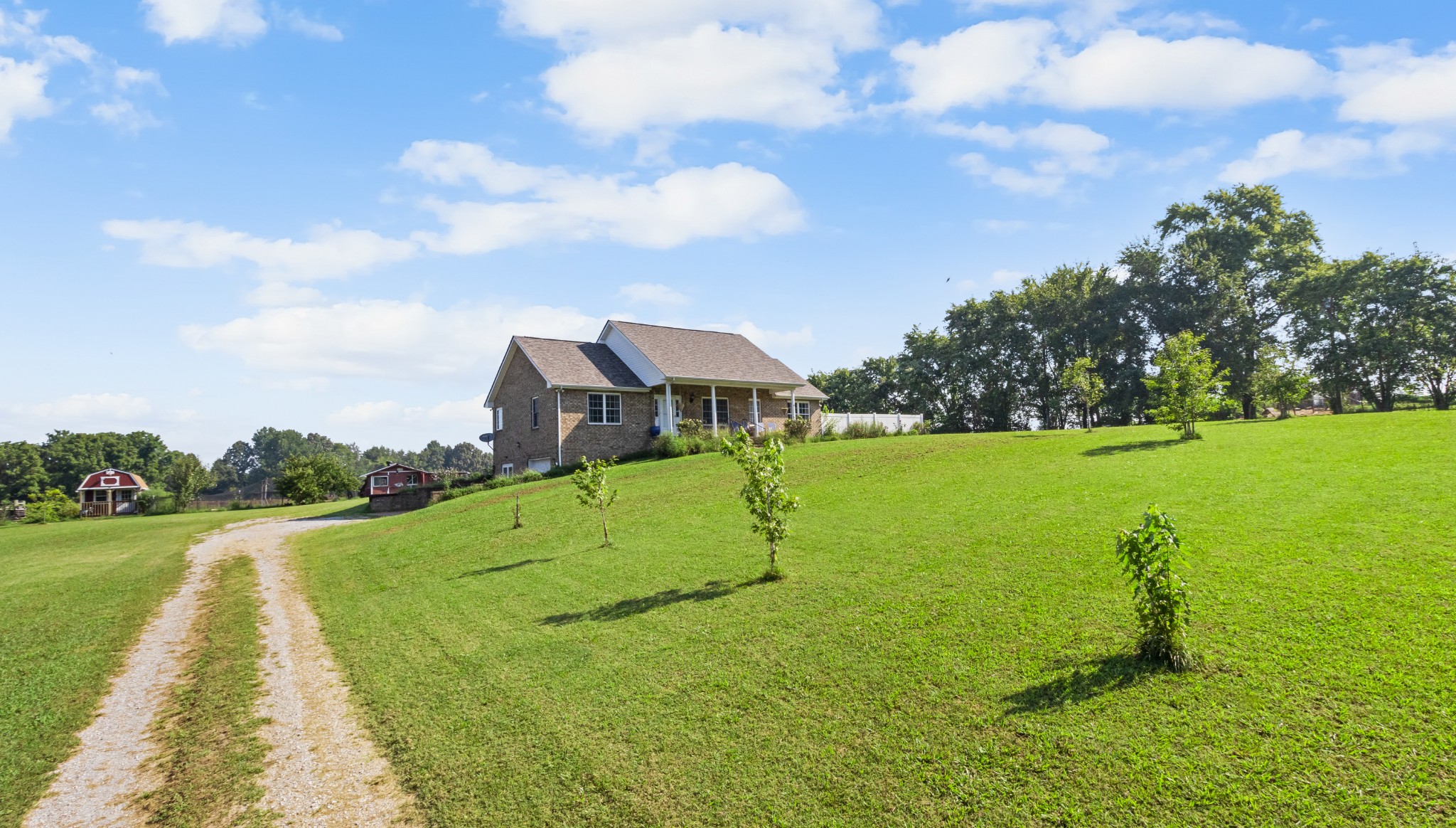 3382 Anderson Road Cedar Hill, TN 37032 - Photo 3 of 41 a view of a garden with a house