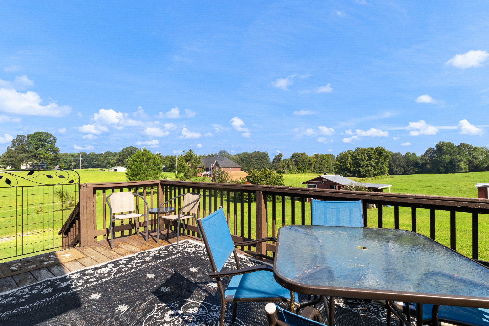 3382 Anderson Road Cedar Hill, TN 37032 - Photo 34 of 41 a view of a balcony with two chairs and a table