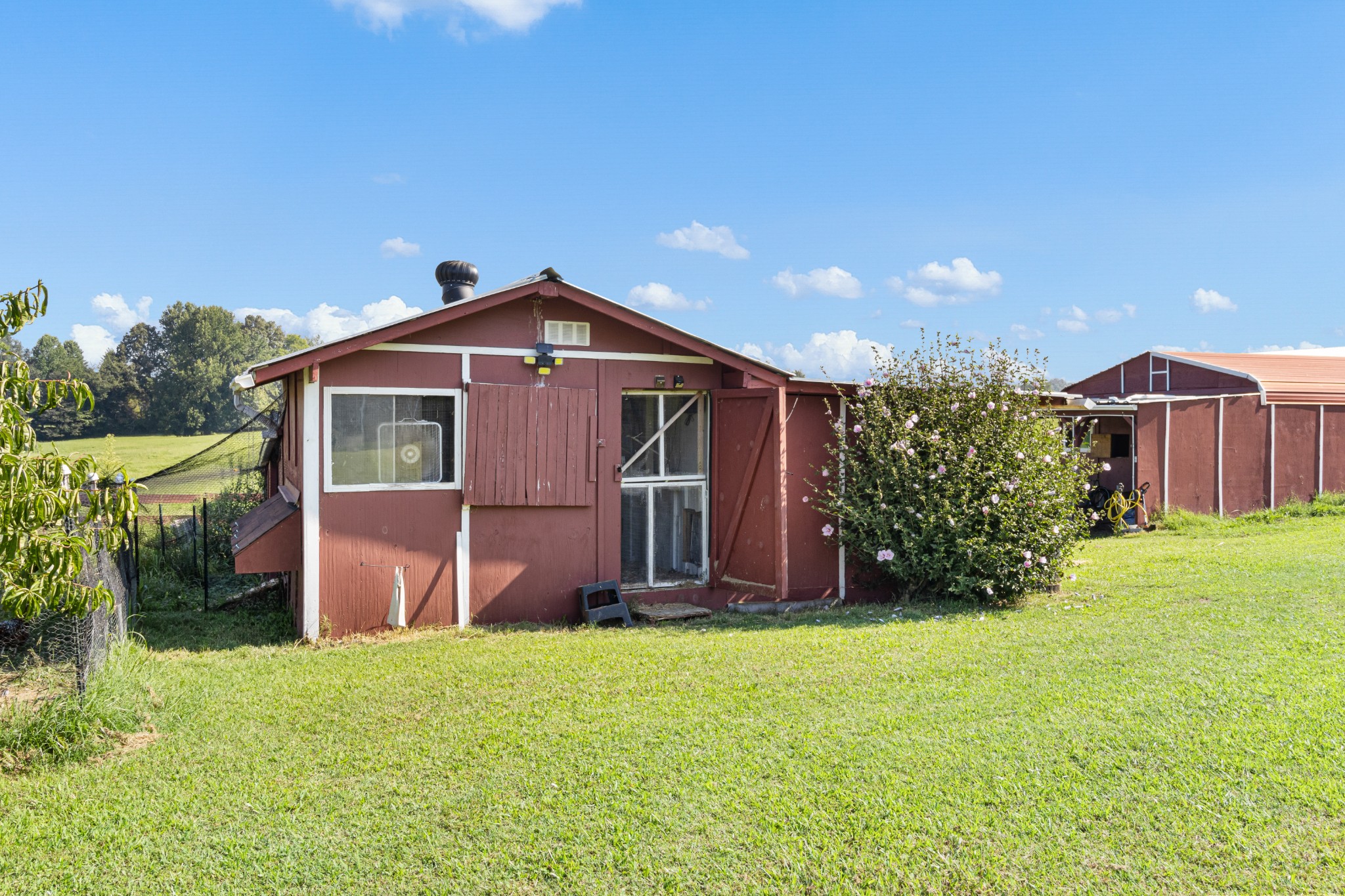3382 Anderson Road Cedar Hill, TN 37032 - Photo 36 of 41 a front view of a house with garden