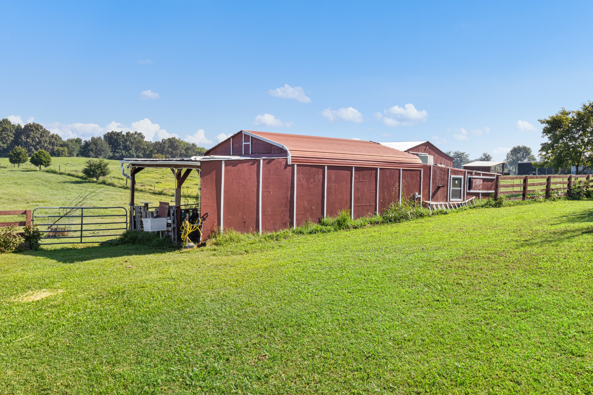 3382 Anderson Road Cedar Hill, TN 37032 - Photo 37 of 41 a view of a house with a yard and sitting area