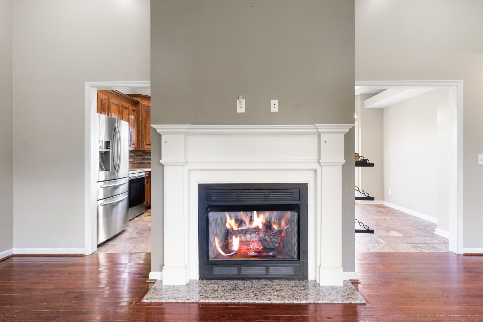 3382 Anderson Road Cedar Hill, TN 37032 - Photo 8 of 41 a living room with a fireplace with wooden floor
