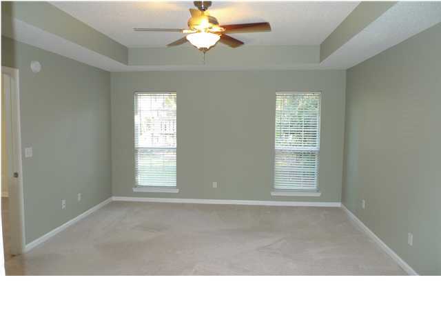 253 Walton Way Miramar Beach, FL 32550 - Photo 15 of 23 a living room with a window and a projector