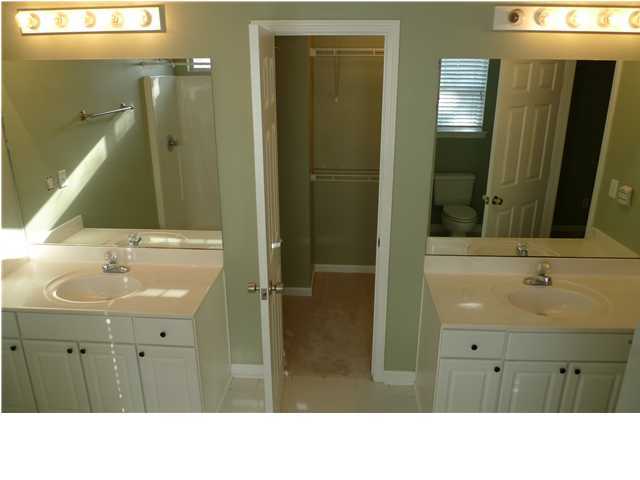 253 Walton Way Miramar Beach, FL 32550 - Photo 17 of 23 a bathroom with a sink a mirror and a shower