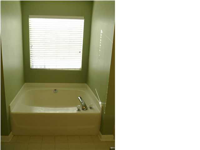 253 Walton Way Miramar Beach, FL 32550 - Photo 20 of 23 a bathroom with a bathtub
