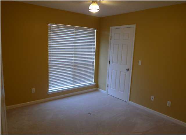 253 Walton Way Miramar Beach, FL 32550 - Photo 4 of 23 a view of empty room with windows