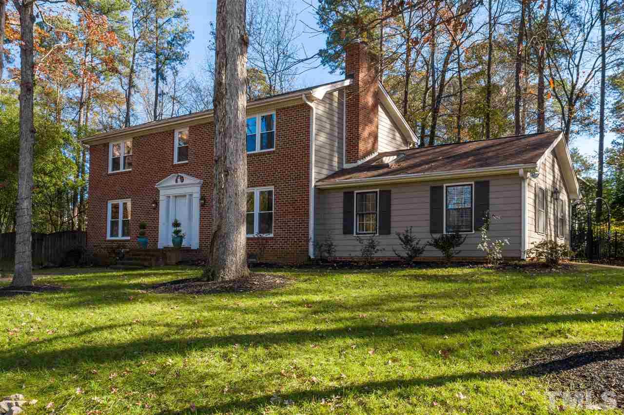 5904 Timber Ridge Drive Raleigh, NC 27609 - Photo 1 of 30 a view of a house with a yard and plants