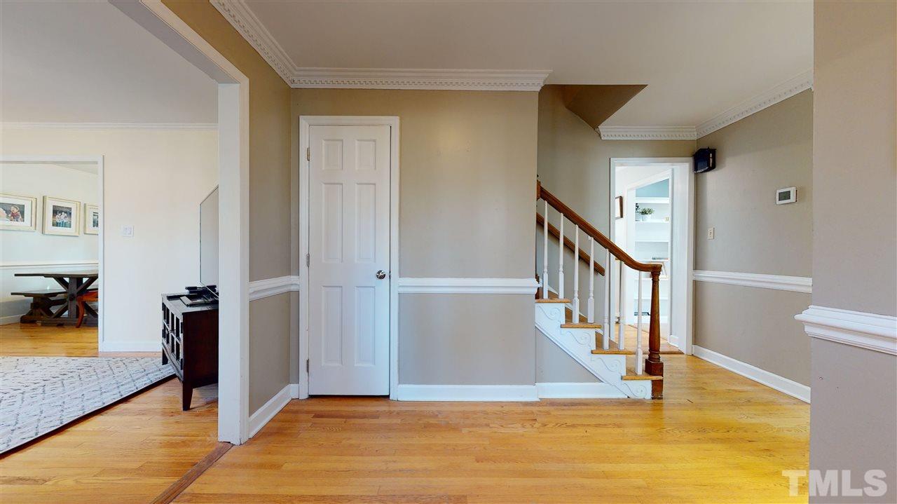 5904 Timber Ridge Drive Raleigh, NC 27609 - Photo 2 of 30 a view of a livingroom with furniture and an entryway