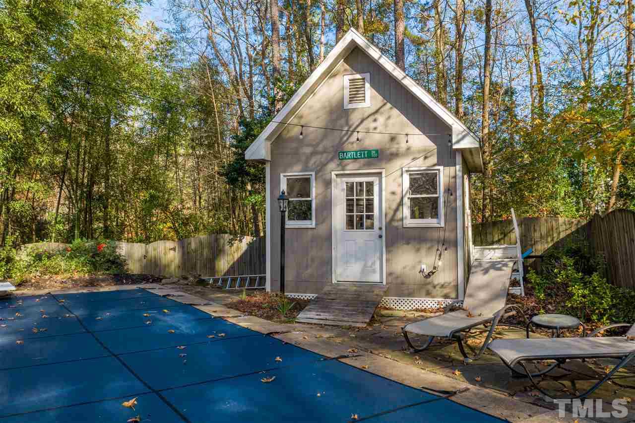 5904 Timber Ridge Drive Raleigh, NC 27609 - Photo 29 of 30 a view of a house with backyard