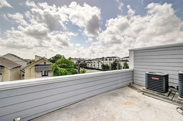 a view of a balcony with city view
