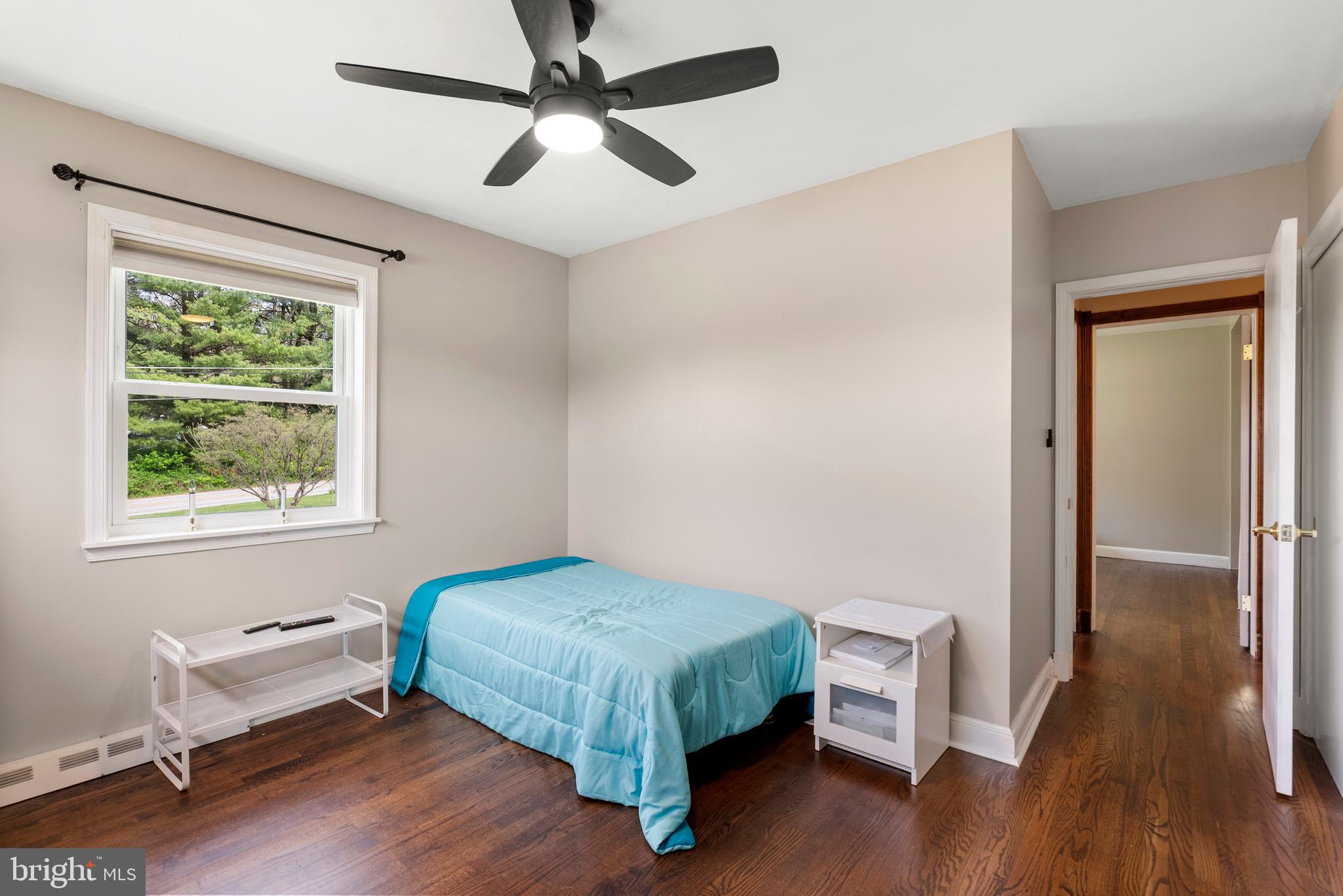 6605 Mt Vista Road Kingsville, MD 21087 - Photo 28 of 54 a bedroom with a bed and a chandelier