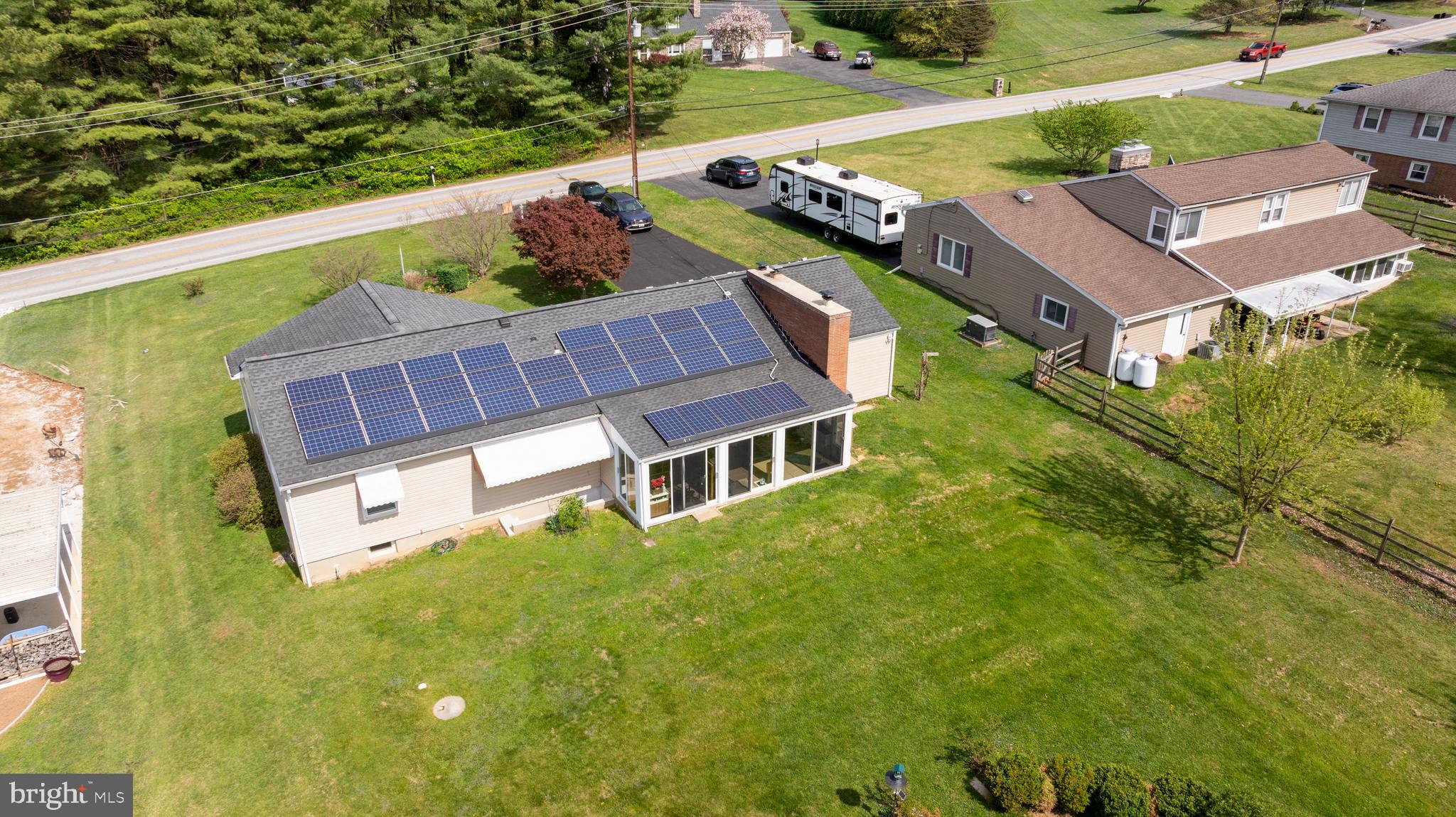 6605 Mt Vista Road Kingsville, MD 21087 - Photo 38 of 54 an aerial view of a house with garden space and a swimming pool