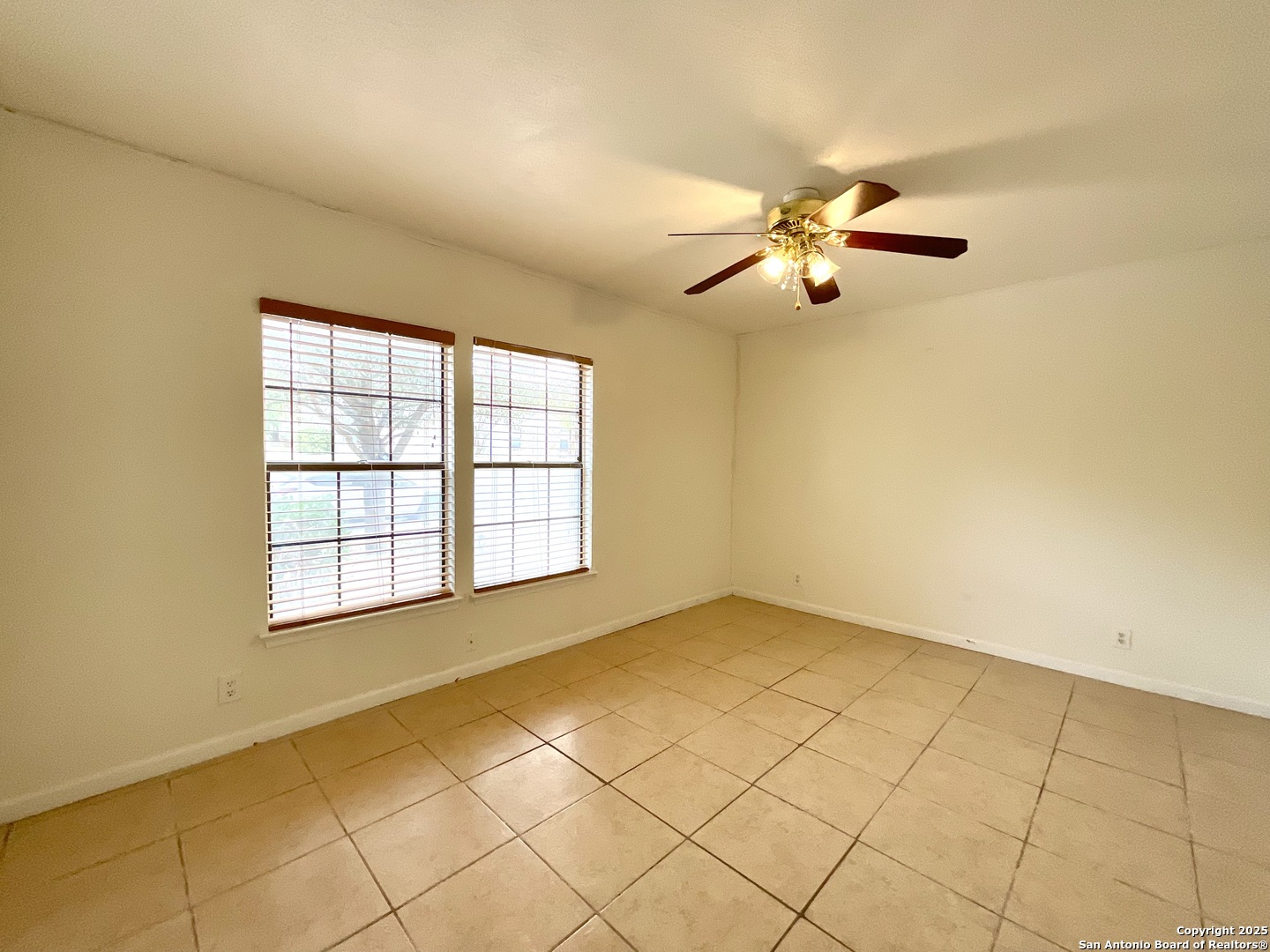 9919 Fortune Ridge Drive Converse, TX 78109 - Photo 17 of 34 a view of empty room with window