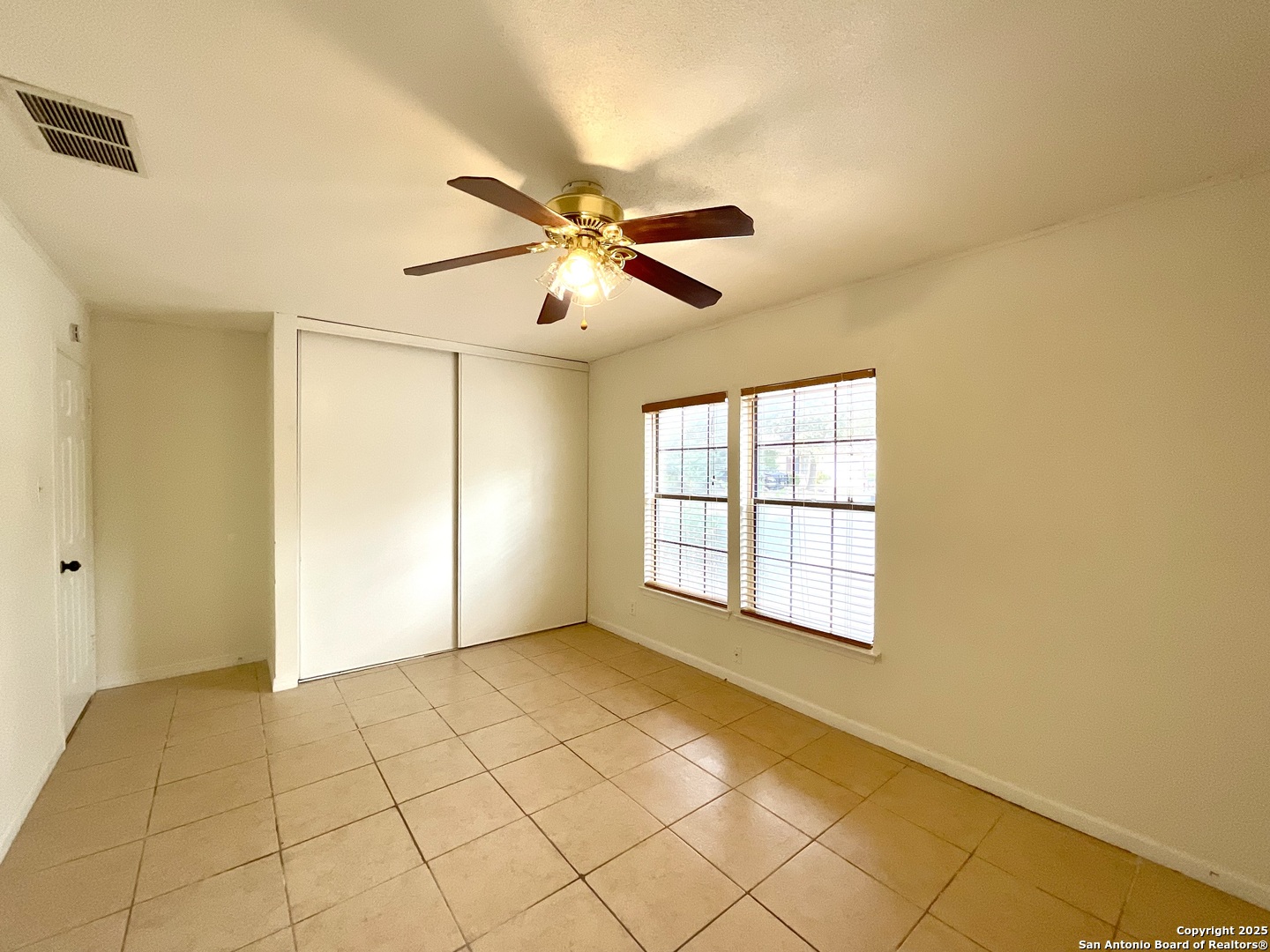 9919 Fortune Ridge Drive Converse, TX 78109 - Photo 18 of 34 a view of an empty room and window